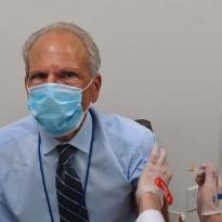 Guglielmo receives flu shot