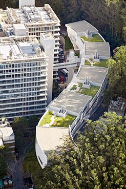 aerial view of the Dolby building curving behind the Health Sciences buildings