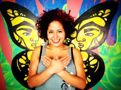 Favianna Rodriguez with butterfly wings