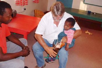 man helping child
