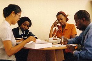 Jennifer Cocohoba with Ugandan clinicians