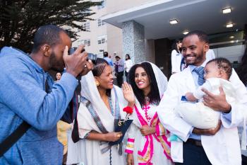 student with family members