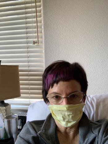 Stebbins wearing mask.