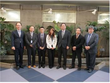 Judie Tran with Tokyo University faculty members and administrators