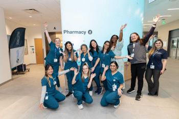 group of smiling pharmacy staff at new Mission Bay pharmacy